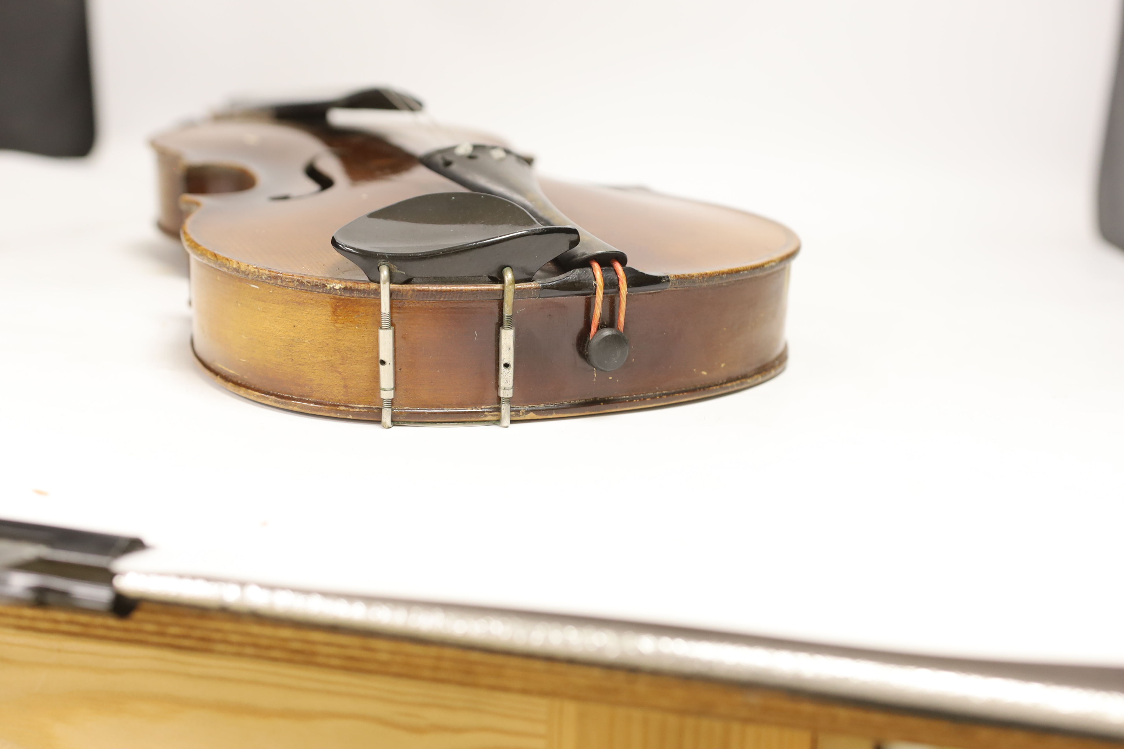 A German Strad violin, back measures 39.5cm, with bow